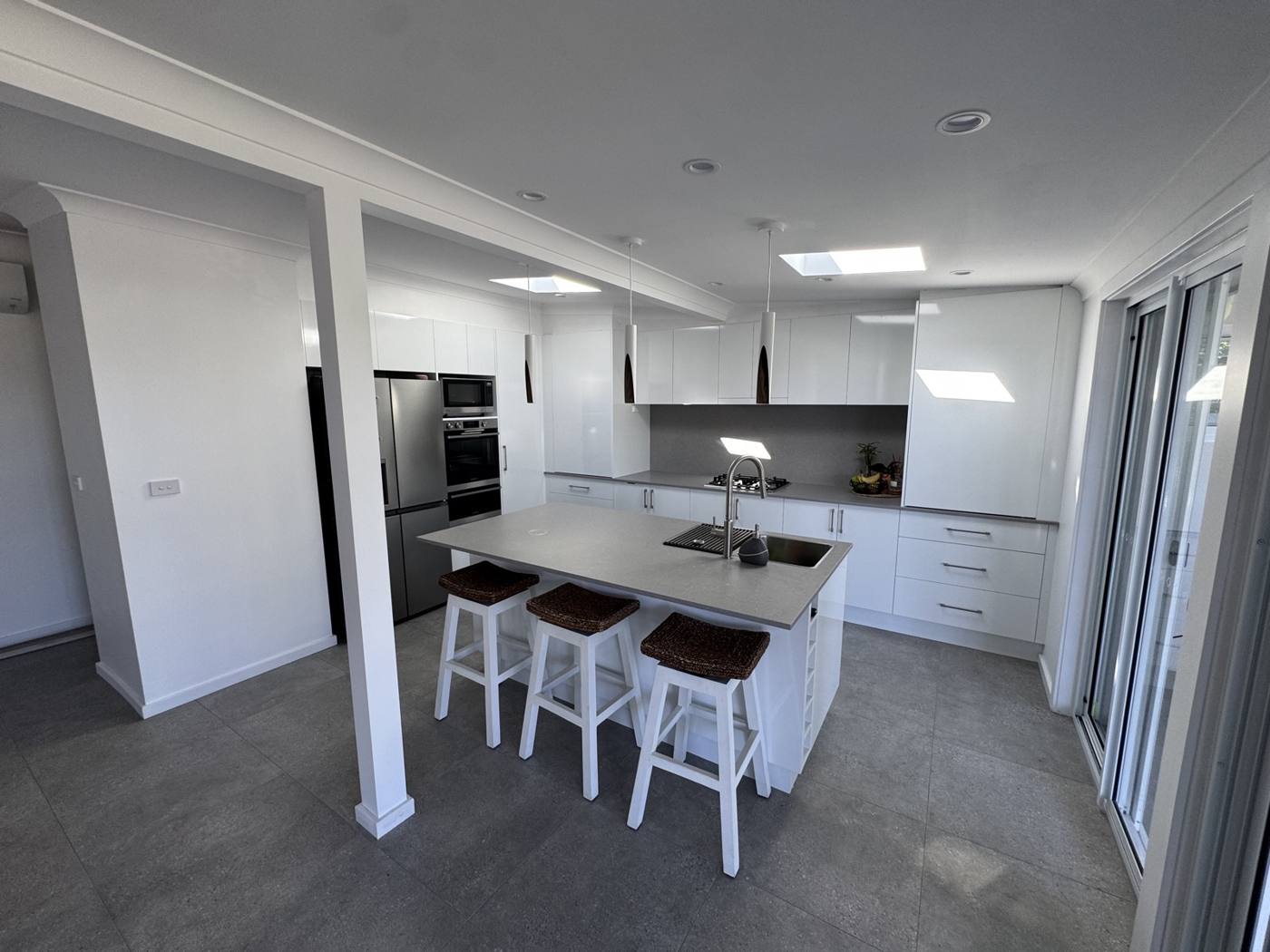 Island kitchen with skylights