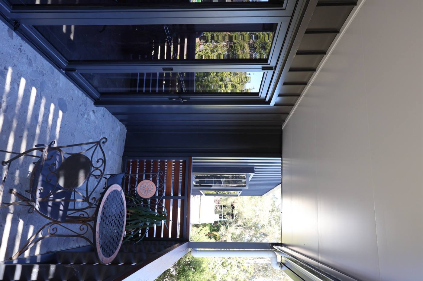 Upper balcony under the Cooldek pergola — Full exterior transformation — San Remo